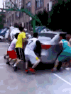 推车 人群 汽车 高楼