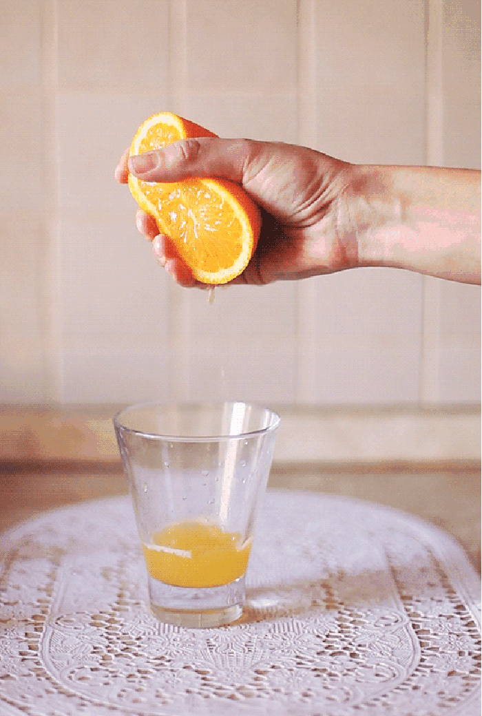 橙汁 杯子 挤压 流淌