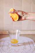 橙汁 杯子 挤压 流淌