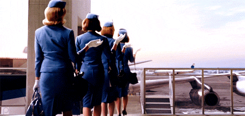 美女 空姐 蓝色制服 优雅 回头 整齐 行走