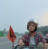 陈小春 打扮 头盔 骑车