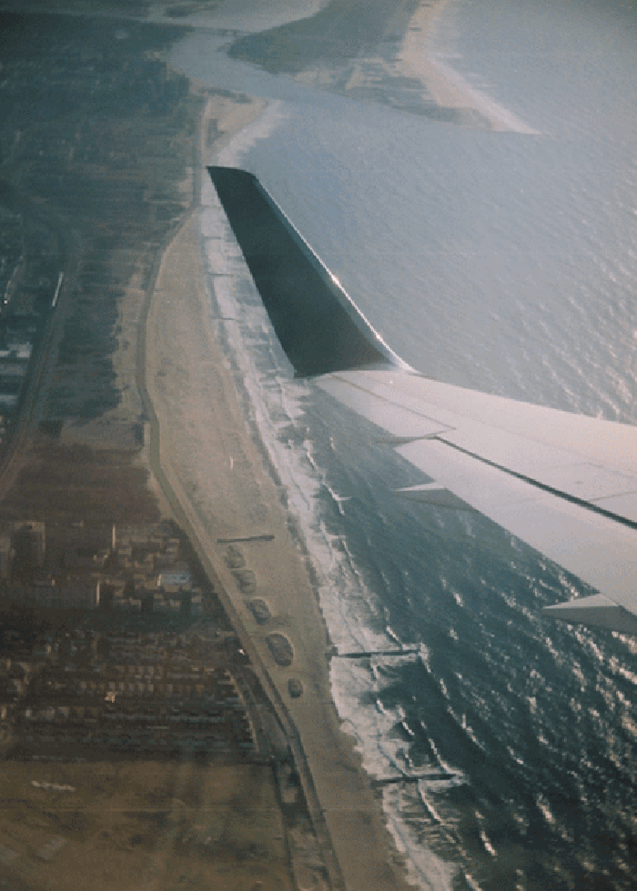 海景 沙滩 飞机 翱翔