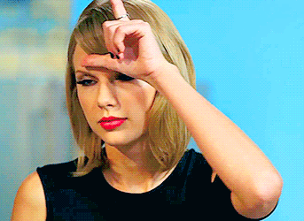 Taylor Swift 泰勒斯威夫特 美女 瞪眼睛 红嘴唇 手指