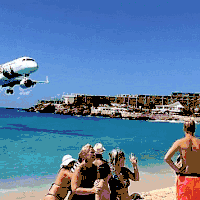 飞机  降落 海滩 旅游