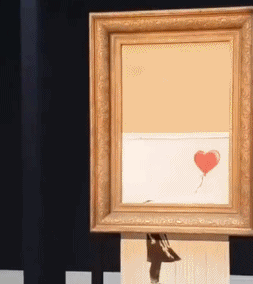 班克斯 自毁画作 女孩与气球 爱在垃圾桶 更名 名画