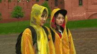 美女 雨衣 点头 乖巧