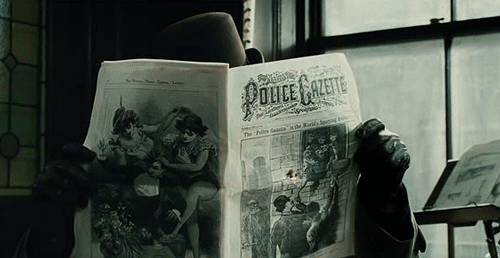裘德·洛 小罗伯特·唐尼 福尔摩斯 一个游戏的影子 看报纸