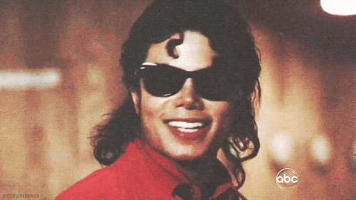 迈克尔杰克逊 戴墨镜 笑容 呲牙