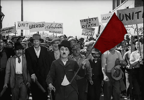 人群 红旗 胡子 帽子
