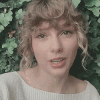 TaylorSwift 卷发 白衣服 树叶